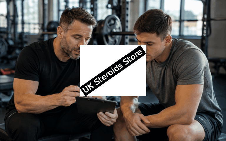 Coach discussing structured training strategies with an athlete.